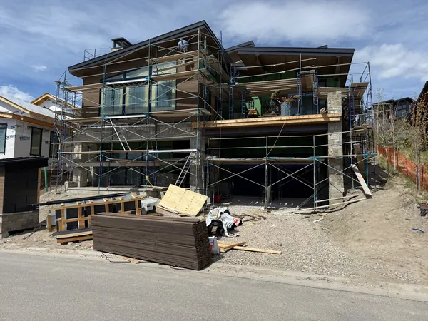 Lot 54 under construction, scaffolding around the framed exterior